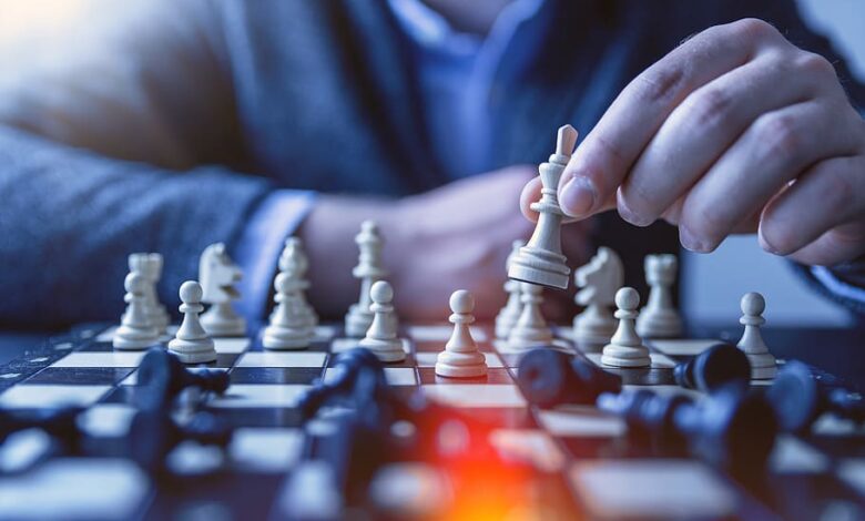board game businessman challenge checkmate