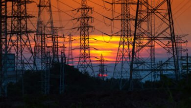 ey electricity distribution station and towers at sunset