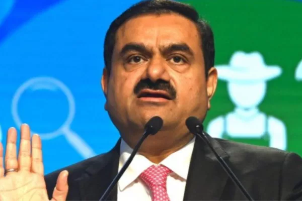adani group sells a stake for $15,446 million,to gqg partners in the us.