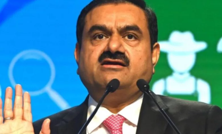 adani group sells a stake for 15446 millionto gqg partners in the us.